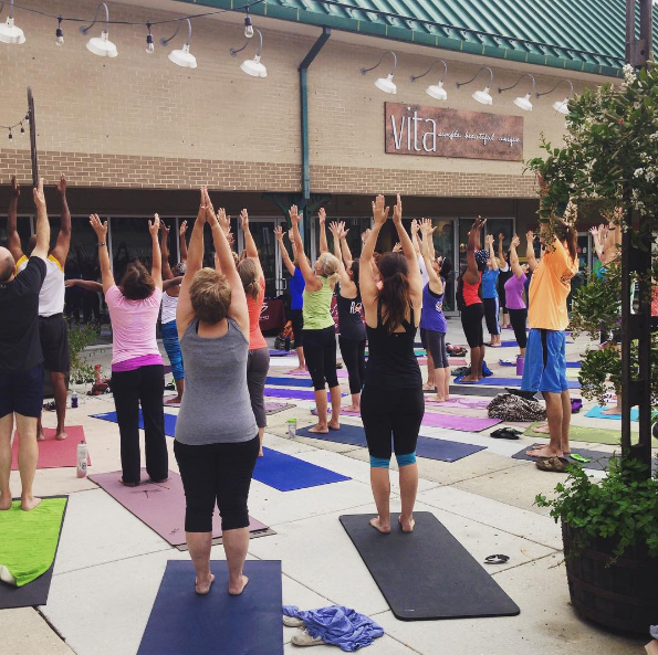 One of many yoga classes hosted outside of VITA's doors on the square.